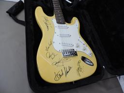 B 52's autographed Laurel electric guitar with case.