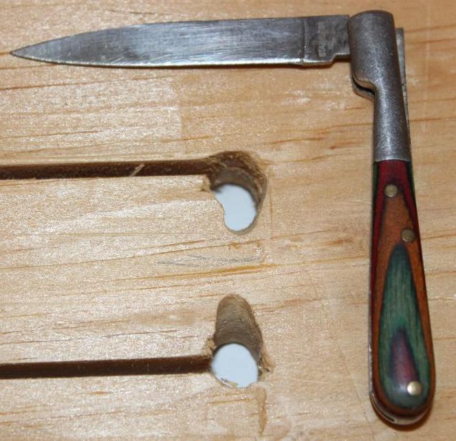 Four Imported Wood-Handle Knives