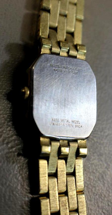 Beautiful Bulova Quartz Lady's Watch with Gold-Colored Band