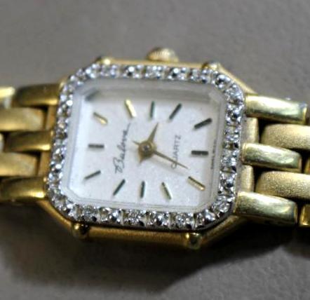 Beautiful Bulova Quartz Lady's Watch with Gold-Colored Band
