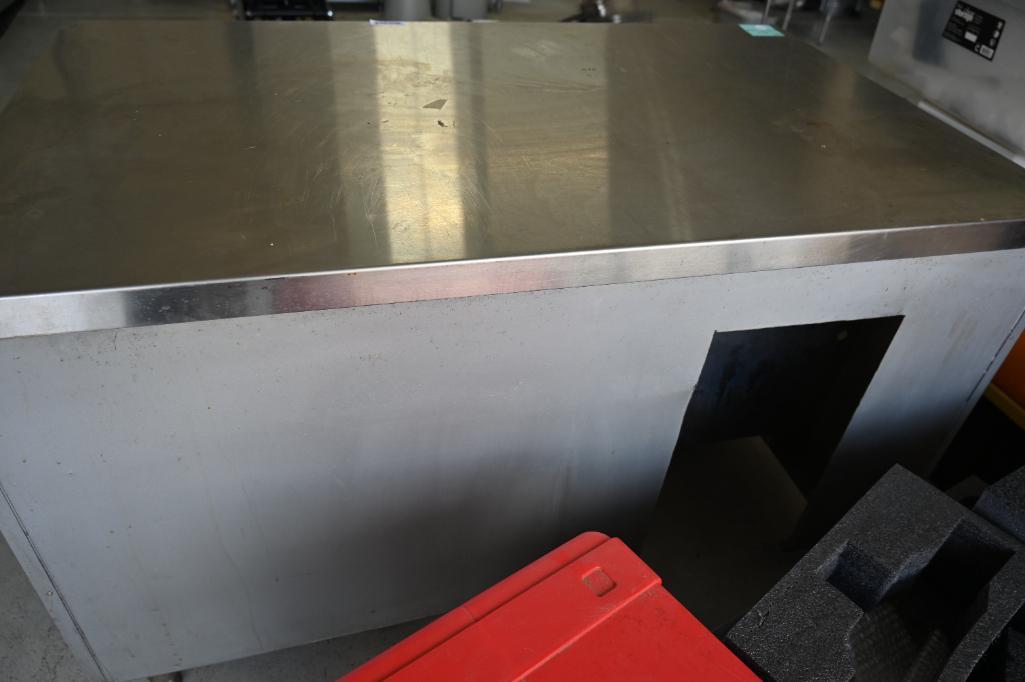 56.25" x 34" x 34.25" Stainless Steel Table with Two Shelves